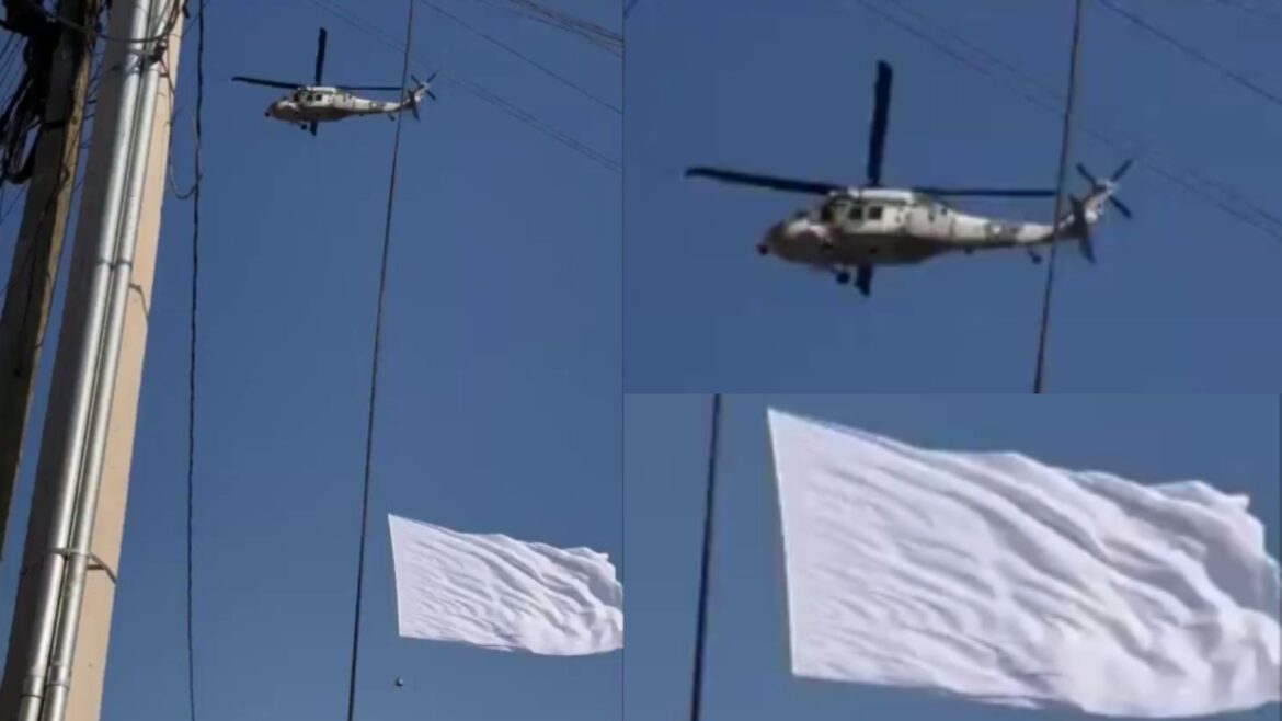 Helicóptero de Fuerzas Armadas sobrevuela Culiacán con una bandera blanca en medio del aumento de violencia